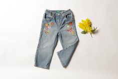 Nice looking vintage 90's United Colors of Benetton jeans with embroideries in front and back. Made of cotton, has stretchy waist and four pockets. Comfy vintage garment for your kids everyday wear. Vintage condition level 4 (very minor signs of wear)* SIZE. Marked size 90, Fits like approx. 18 - 24 months. To be sure it would fit please check the measurements below.  FLAT Measurements: Side to side: 9 " / 23 cm Length: 19 1/2 " / 49.5 cm Inseam: 12 " / 30.5 cm SKU - C322 *We assess the conditio Playful Cotton Jeans For Spring, Playful Spring Cotton Jeans, Toddler Pants, Pants Vintage, Vintage Kids, Baby Pants, Jeans Kids, United Colors Of Benetton, Gender Neutral Baby