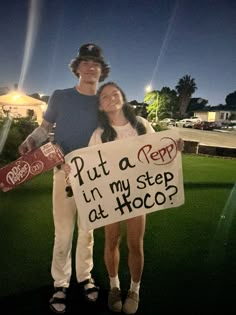 a man and woman holding a sign that says put a pep in my step at hoco?