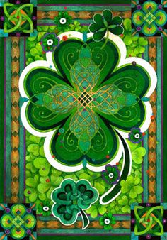 a green shamrock with four leafed clovers on it's sides and an ornate border