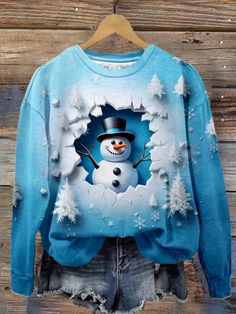 Multicolor Long Sleeve Christmas Tops, Winter Printed Sweater, Winter Blue Printed Tops, Blue Long Sleeve Christmas Tops, Blue Long Sleeve Tops For Christmas, Blue Long Sleeve Tops For Winter, Blue Tops For Holiday And Fall Season, Winter Holiday Long Sleeve Tops, Blue Crew Neck Top For Holiday