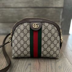 Gucci Ophidia Textured Leather-Trimmed Printed Coated-Canvas Shoulder Bag. Only Used A Few Times, Looks Brand New Gucci Beige Bag With Zipper Closure, Beige Gucci Bag With Zipper Closure, Beige Gucci Bag With Zipper, Ophidia Gg Small Shoulder Bag, Red Web, Gucci Ophidia, Gucci Crossbody, Mini Bucket Bags, Green And Red