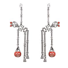 PRICES MAY VARY. Make a spooktacular statement this Halloween season with our adorable skeleton earrings! Festive dancing skeletons wearing little bows and holding a jack o lantern will turn heads for sure! Hypoallergenic surgical steel post drop earrings measure 4.25 inch length and 1.25 inch width. Metal dangle earrings with colorful enamel accents on the bows and pumpkins. Get in the Halloween spirit with these fun earrings! These whimsical earrings are so comfortable and can be worn all day Halloween Costume Jewelry, Skeletons Halloween, Multi Strand Pearl Necklace, Skeleton Earrings, Dancing Skeletons, Easter Jewelry, Western Necklaces, Casual Earrings, Western Earrings