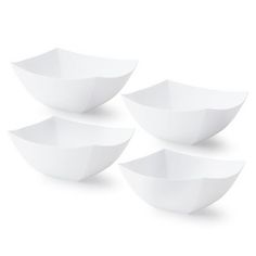 four white bowls sitting on top of each other