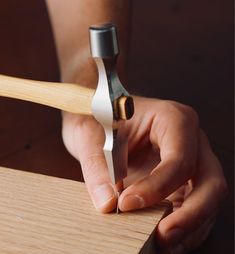 A refinement of a traditional British furnituremaking hammer, this cross-peen hammer is a first-rate tool for setting and driving small nails. With a conventional round-headed hammer, if the nail is too short to project higher than the tips of the thumb and finger holding it, hitting yourself is practically unavoidable. This hammer's narrow cross-peen face slips easily between your fingertips, striking the nail without catching your digits. Once the nail is set, you can finish sinking it with th Finger Holding, Hammer Tool, Small Nails, Skin Hand, Plant Protection, Hammers, Hand Care, Power Tool Accessories, Home Maintenance