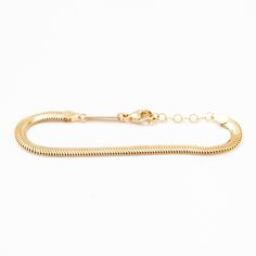 This Medium Oval Snake Chain Bracelet is perfect for those looking to add some class and texture to their stack! Its classic style complements other chain bracelets in the most beautiful way for a unique look. Made in the U.S.A. Chain is adjustable and measures 7" long. Also available in Small Oval Snake Chain Bracelet. 14 karat. Band Necklace, Zoe Chicco, Snake Chain Bracelets, Chain Bracelets, Single Stone, Diamonds And Gold, Band Engagement Ring, Pendant Earrings, Snake Chain