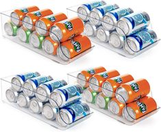 six cans of soda are stacked on top of each other and one is filled with orange,