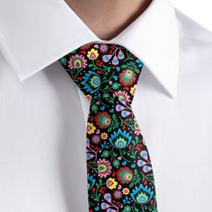 These joyful floral ties pay homage to wycinanki, the traditional Polish folk art of paper cutting. Some historians believe wycinanki originated when peasants cut designs into their window coverings to let in sunshine and air. Either way, these folksy wedding ties are certainly a dose of sunshine! The colors in this design are fully customizable, making these floral wedding ties the perfect match for your celebration. As groomsmen ties, they are playful and energetic. To make the Electric Daisy Folksy Wedding, Funky Formal, Floral Ties, Electric Daisy, Polish Folk Art, Floral Necktie, Groomsmen Ties, Polish Folk, Wedding Ties