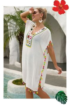 One Size Soft white swim cover up with colorful tassels trim and crochet neckline. Semi sheer. Colors include magenta, light pink purple, green, yellow, light gray Tassel colors include: neon coral, purple, green, yellow B3/ Bohemian Multicolor Tassel Cover-up, Casual White Cover-up With Crochet Trim, White Hippie Beach Dress For Beach Party, Summer White Cover-up With Crochet Trim, Bohemian Style Cover-up With Crochet Trim For Vacation, Summer Festival Cover-up With Crochet Trim, White Crochet Trim Cover-up For Summer, White Hippie Beach Dress, White Summer Festival Cover-up