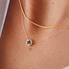 "Celebrate your birth month September as your favorite month of the year with this unique diamond sapphire necklace handcrafted in 14k solid gold. The halo of diamond stones encircles the elevated sapphire gemstone in a simplistic way. ‣ 2 Years Warranty ‣ Free Express International Shipping ‣ Free returns within 30 days from the order date Features * Made to Order. * Material: Solid Gold (real solid gold, no gold-filled or no gold plated material) * Gold KT: 14K * Choice of Gold Color: Yellow G Blue Sapphire Pendant, Blue Sapphire Necklace, Halo Necklace, Necklace Diamond, Gold Diamond Necklace, Sapphire Pendant, Gold Halo, Buying Diamonds, Unique Diamonds