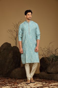 Aqua Blue Paisley Printed Blended Silk Kurta Set Traditional  Wear  Care Instructions: Dry Clean Blended silk kurta with Stichline & front potli placket. Top Details: Color- Aqua Blue, Fabric - Blend slik Bottom Details Color - Natural, Style - free size Chudidar, Fabric -Dhupion Silk Package Include: Kurta and Pajama Additional Information : - As this Sherwani/Waistcoat/Kurta is stitched & made as per orders requested only, So there is NO RETURN & NO EXCHANGE on this product. Kindly Choose your Printed Mens Kurta, Ceremonial Cotton Silk Straight Kurta, Ceremonial Cotton Silk Kurta With Traditional Drape, Blue Chanderi Sherwani For Diwali, Ceremonial Cotton Silk Kurta For Navratri, Fitted Blue Chanderi Sherwani, Blue Chanderi Sherwani For Festive Occasions, Ceremonial Cotton Silk Traditional Wear With Long Sleeves, Festive Blue Chanderi Sherwani