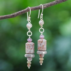 Siriporn's pale earrings are perfect for a walk through the woods. The Thai artisan hand threads grey agate beads, purple glass beads and brown jasper gems to create the earrings. Stamped 950 silver beads add a touch of shine, while sterling silver hooks complete the pair. Thailand Gifts, Brown Jasper, Jasper Bead Bracelet, Rustic Earrings, Grey Agate, Earring Designs, Agate Earrings, Daily Walk, Jasper Beads