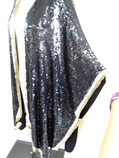 "This vintage piece is beautifully embellished with sequins and beading. It's in perfect condition! There are no closures. Size fits all. Measures 32-40\" long, 42\" across (or fits up to 80\" bust with the front brought together) and the arm openings have a 25\" circumference. All of my items come from a smoke-free and pet-free home. If you have any questions, please don't hesitate to ask!" Traditional Evening Kaftan With Sequins, Embellished Fitted Long Abaya, Traditional Sequin Fabric For Evening, Festive Hand Embellished Sequin Fabric, Festive Hand-embellished Sequin Fabric, Elegant Festive Sequined Abaya, Elegant Sequin Fabric With Mirror Work For Evening, Fitted Sequin Kaftan For Parties, Embellished Fitted Evening Abaya