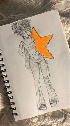 a drawing of a girl with an orange star on her back, and the bottom part of her body is drawn in pencil