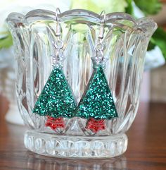 Christmas tree sparkly dangle earrings.  Made with resin.  Very lightweight. Resin Christmas Earrings, Resin Christmas Tree Earrings, Etsy Earrings Dangle, Wedding Basket, Halloween Shopping, Jewelry Earrings Dangle, Dangle Drop Earrings, Dangle Earrings, Christmas Tree