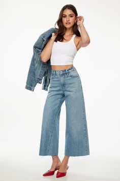 Meet Chloe, our high-waisted ultra wide-leg non-stretch denim jeans. Features - Belt loops - Zipper fly - 5-pocket styling - Cropped raw hem Size & Fit - Non-stretch - Relaxed fit - Ultra wide-leg - High waist: 11" - Inseam length: 26" Materials & Care - 85% Cotton, 15% Recycled Cotton - Wash cold, inside out - Imported Trouser Pants, Cropped Jeans, Inside Out, Recycled Cotton, Stretch Denim, Denim Jeans, Chloe, Wide Leg, Zipper