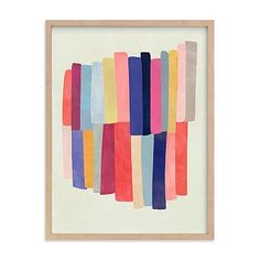 an abstract painting with multicolored stripes in a wooden frame on a white wall