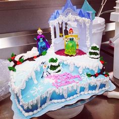 there is a cake that looks like it has been made to look like disney's castle