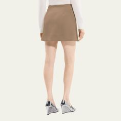 Theory solid knit skirt tailored with back darts High rise A-line silhouette Hem hits mid-thigh Slip-on style Wool/cashmere Dry clean Imported Knit Skirt, Bergdorf Goodman, Mini Skirt, Tops Designs, Cashmere, A Line, High Rise, Mini Skirts, Dry Clean