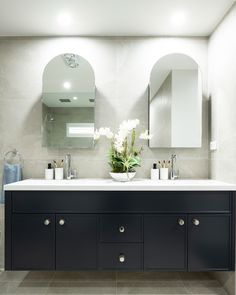 Heritage style bathroom inspiration featuring dual basins, arch mirror bathroom cabinet and black vanity for a minimalist look. 

Reece featured products 🛁:
@logicohomes: Posh Canterbury Basin mixer and Kado Neue Arch Mirror Cabinet