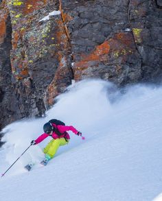 a person on some skis in the snow