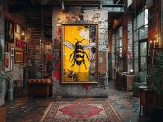 a yellow and black bee painting on a brick wall in an industrial building with lots of windows