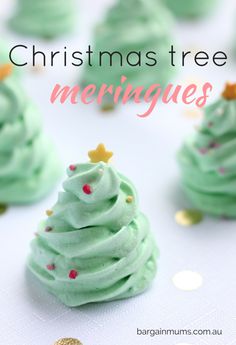 christmas tree meringues with green frosting and gold sprinkles