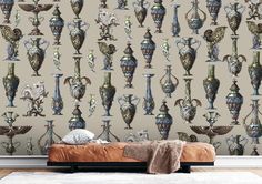 a wallpapered room with vases on it