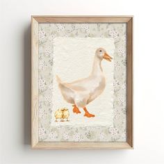 a watercolor painting of a duck and its chickling in front of a white wall