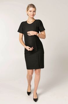 This maternity dress is a remix of a classic A-line design, featuring a sheath silhouette and stretch built for every phase ofpregnancy. Hidden zips under princess seam allow for discreet breastfeeding access. 38 1/2" length Jewel neck Back zip closure Short sleeves 38% recycled polyester, 36% polyester, 21% viscose, 5% elastane Hand wash, dry flat Imported Elegant Short Sleeve Maternity Dress Bump Friendly, Elegant Bump-friendly Maternity Dress, Elegant Fitted Bump-friendly Dresses, Fitted Knee-length Maternity Dress, Elegant Fitted Maternity Dress Nursing Friendly, Fitted Black Maternity Dress, Nursing Friendly Fitted Knee-length Dress, Knee-length Fitted Nursing-friendly Dress, Black Nursing-friendly Maternity Dress