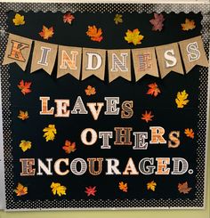 a sign that says kindness leaves others encouraged with fall leaves on it