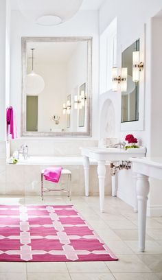 a bathroom with pink and white decor in the colors pantone's 2013 color of the year