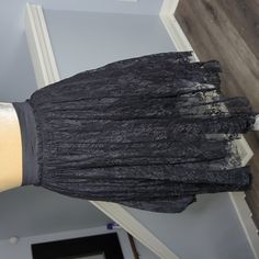 Size Medium New With Tags.. Gothic Black Pleated Skirt, Gothic Black Flared Skirt, Black Gothic Skirt For Evening, Black Lace Skirt For Party, Black Lace Party Skirt, Gothic Flared Skirt For Party, Black Lace Lined Skirt, Black Lace Skirted Bottoms, Black Lace Mini Skirt For Party