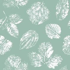 a green and white leaf pattern on a light blue background for wallpaper or fabric