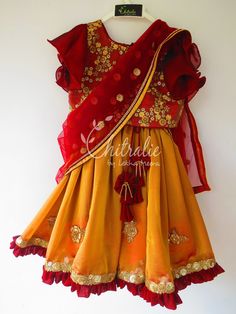 This ethnic lehenga featuring cape sleeve and jerry worked choli and tutu edged skirt accompanied with a sequienced dupatta. Please Visit My Shop For More Unique Collection https://www.etsy.com/shop/Chitralie BUYER'S PLEASE LEAVE YOUR CONTACT NUMBER. It's necessary for shipping. Fabric and Work Choli: Cape sleeve with jerry and sequence embroidered tissue fabric. The choli is lined in soft cotton fabric and ties at the back. The hanging is made with unique fabric flowers. Skirt: Gathered shimmer Maroon Butterfly, Brown Lehenga, Ethnic Lehenga, Maroon Lehenga, Tissue Fabric, Kids Lehenga Choli, Kids Ethnic Wear, Kids Lehenga, Kids Designer Dresses