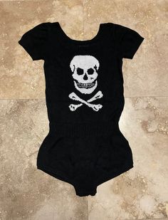 "RARE - Betsey Johnson - SKULL 💀 Romper Wear & style this so many ways!   From my personal collection! SUPER RARE,   SOLD OUT & NO LONGER AVAILABLE anywhere         ONLY ONE AVAILABLE LOVE ROCKS MODERN  ITEM DETAILS & DESCRIPTION .  Amazing Skull Romper .  Knit  .  Crotch Button Up  Label:  Betsey Johnson  Size:  M - refer to measurements - has stretch to fabric - NO RETURNS FOR NOT FITTING!  Color:  Black, White/Off White - refer to Photographs Material:  Knit  Pattern:  Skull - Refer to Photo Rihanna Love, Romper Jumpsuit, Love Rocks, B Movie, Punk Goth, Novelty Print, Edgy Outfits, Vintage Love, Comfy Outfits