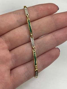 18ct Yellow Gold Ladies Emerald & Diamond Tennis Bracelet  🔹Length - 185mm (7 inch) 🔹Sale Price - £1150.00 All articles come presented in a gift box Luxury Green Gold Bracelet For Anniversary, Rectangular Tennis Bracelet Fine Jewelry Gift, Rectangular Fine Jewelry Tennis Bracelet As Gift, Yellow Gold Baguette Cut Tennis Bracelet, Gold Baguette Cut Tennis Bracelet Gift, Fine Jewelry Gold Bracelets With Channel Set, Gold Channel Set Bracelet, Yellow Gold Diamond Bracelet, Channel Set, Diamond Tennis Bracelet