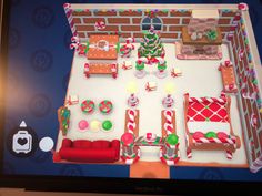 a computer screen showing a living room decorated for christmas