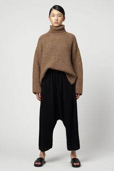 Oversized turtleneck pullover in our alpaca / pima cotton knit. Contrasting fibers add visual depth and breathability to this cozy cold weather essential. Boxy fit and a sporty, luxurious feel. - Oversized folded turtleneck - Dropped shoulder - Side vents - Falls to low hip Fabric Notes Alpaca / Pima Cotton Knit Dry Clean OnlyMade in Peru Model is 5’10 wears size XS/S Styling Sweaters, Rare Fashion, Turtleneck Pullover, Fashion Journals, Oversized Turtleneck, Denim Hat, Jumpsuit Jacket, Knit Turtleneck, Bandana Scarf