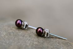 3mm pearls are tiny, but these tiny beauties are so perfect! Meticulously matched and set on fine sterling silver. Pearls are very bright peacock purple, perfectly round. Unisex pearl earring studs. Singles are available. Pearl size: 3mm Sterling silver posts and backings Hand set in California, USA Pearl Earring Studs, Keshi Pearl Earrings, Round Pearl Earrings, Small Pearl Earrings, Teardrop Pearl Earrings, Pink Pearl Earrings, Black Pearl Earrings, Peacock Pearl, Single Pearl