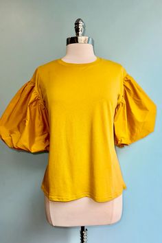 Mustard Jersey Puff Sleeve Top – Modern Millie Modern Millie, Rockabilly Style, Yellow T Shirt, Kids Outerwear, Puff Sleeve Top, Style Gift, Wedding Wear, Holiday Fashion, Mustard Yellow