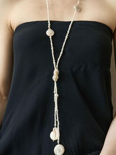 A BIT MOR is inspired by things we encounter in real life and reinterprets androgynous sensibilities and trends.- Long length necklace for a variety of looks- Length adjustable by tying- Mix and match freshwater pearls and baroque pearls- Daily point item Adjustable White Lariat Drop Necklace, White Adjustable Lariat Drop Necklace, Elegant Lariat Necklaces Hand Knotted, Elegant Hand-knotted Lariat Necklaces, Bohemian Necklace With Unique Variations, Elegant White Necklace With Adjustable Length, Long Necklace With Adjustable Length, Adjustable Long Necklace, Elegant Hand Knotted Lariat Jewelry