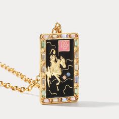 Welcome to the luxurious world of Death Tarot Card Necklaces. Crafted with immaculate attention to detail, these beautiful necklaces feature an intricately-designed Tarot Card of Death in brass endings, bringing a touch of sophistication and timelessness to any look. Experience an exquisite blend of style and artistry with this elegant necklace. DETAILS Plating: 18K Gold Materials: 18K Gold on Brass, Cubic Zirconia Measurements: Length: 19.69"(50cm) + Pendant: 1.57"(4.0cm) Pendant Size: length:1 Tarot Card Necklace, Diamond Star Necklace, Star And Moon Necklace, Everyday Wear Jewelry, Card Necklace, Diamond Evil Eye, Talisman Necklace, Fruit Jewelry, Lucky Bracelet