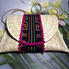 This purse is handwoven in Mexico from sustainable palm leaves decorated with unique applications. Made by Mexican Artisans with love and dedication. It is wonderful for a picnic, for a girl's day out. The perfect accessory to make any outfit stand out. It can be the ideal gift for a friend, mom, or sister. etc. Measurements: Length: 12 inches Height: 8.5 inches Leaf Purse, Straw Purse, Purse Handmade, Girl Day, Palm Leaf, Purse Clutch, Palm Leaves, Clutch Handbag, Beautiful Bracelet