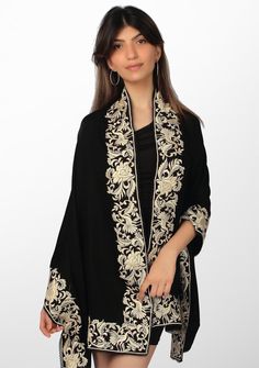 This luxurious black cashmere scarf features a stunning inner border of a floral-bird embroidery in a contrasting beige color. Elevate your style by wrapping yourself with elegance, style, and warmth in this captivating scarf finished with a tiny tonal black-colored lace edging. A perfect accessory for all occasions. Luxury Shawl With Embroidered Border, Black Cashmere Scarf, Elegance Style, Border Embroidery, Bird Embroidery, Lace Edging, Cashmere Scarf, Ivory Color, Dream Dress