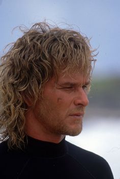 a close up of a person wearing a wet suit