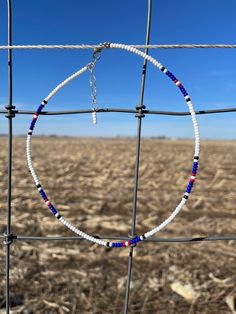 "This beautiful, beaded choker goes perfect with any outfit or occasion. This choker is inspired by traditional western jewelry but is not in any way \"authentic western jewelry\". This choker will make the perfect gift for anyone or something to \"treat yo self!\". All of my chokers are made with a flexible beading wire and come in a variety of lengths, so you make sure you get the perfect fit! INFO ON BEADING WIRE AND WHY I USE IT When I first starting make these chokers it was a lot of trial and error. I started by making them with elastic, stretchy string. I noticed that the elastic material would degrade after a lot of uses, which resulted in the necklaces thinning, and breaking. I did some research and found that making the chokers with the beading wire made them stronger, which resu Western Style Round Beaded Necklaces For Gifts, Western Style Round Beaded Necklaces As Gift, Beaded Western Jewelry, Diy Western Jewelry, Western Jewelry Necklace, Red Stone Necklace, Flag Beads, Rodeo Jewelry, Simple Beaded Necklaces