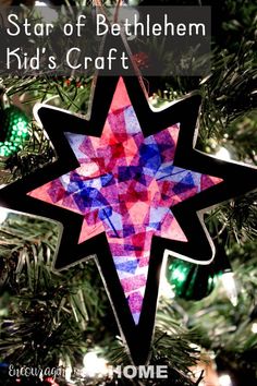 an ornament hanging from a christmas tree with the words star of bethlehem kids'craft