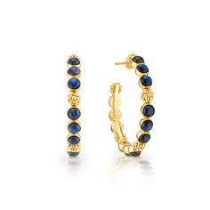 Classic hoop earrings are adorned with lustrous clusters of cabochon gems and a sprinkling of golden berries for a look that is polished and feminine. These hoops add a fabulously feminine flourish to any ensemble—whether you’re running a meeting, hosting a dinner party or jet-setting to Monaco. Elegant Hoop Jewelry With Gemstone Accents, Elegant Round Hoop Earrings With Gemstone Accents, Gold Elegant Hoop Earrings With Gemstone Accents, Elegant Gold Hoop Earrings With Gemstone Accents, Elegant Small Hoop Gemstone Earrings, Elegant Gold Hoop Earrings With Natural Stones, Golden Berries, Bridal Handbags, Medium Hoop Earrings