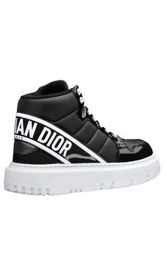 The D-Player sneaker draws inspiration from the basketball shoe and offers a modern variation on a timeless style. The quilted nylon style is enhanced by patent details and is further distinguished by a black CHRISTIAN DIOR signature on the band at the back. The supple and lightweight sole completes the contemporary sneaker.Round toeTreaded soleLace-upUpper: Technical Fabric, Leather; Sole: EVAMade in Italy Luxury Black High-top Sneakers For Sports, Luxury High-top Patent Leather Sneakers, Modern High-top Patent Leather Sneakers, Modern Patent Leather High-top Sneakers, Designer Patent Leather Sneakers With White Sole, Luxury Black High-top Sneakers For Streetwear, Designer Black Patent Leather Sneakers, Black High-top Patent Leather Custom Sneakers, Luxury Black High-top Sneakers With Contrast Sole