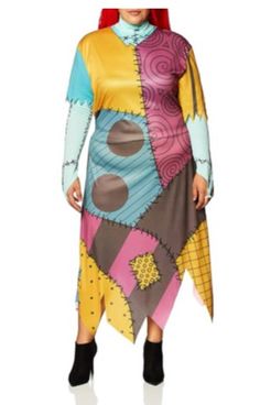 a woman is dressed in a costume that looks like an abstract dress with different colors and shapes